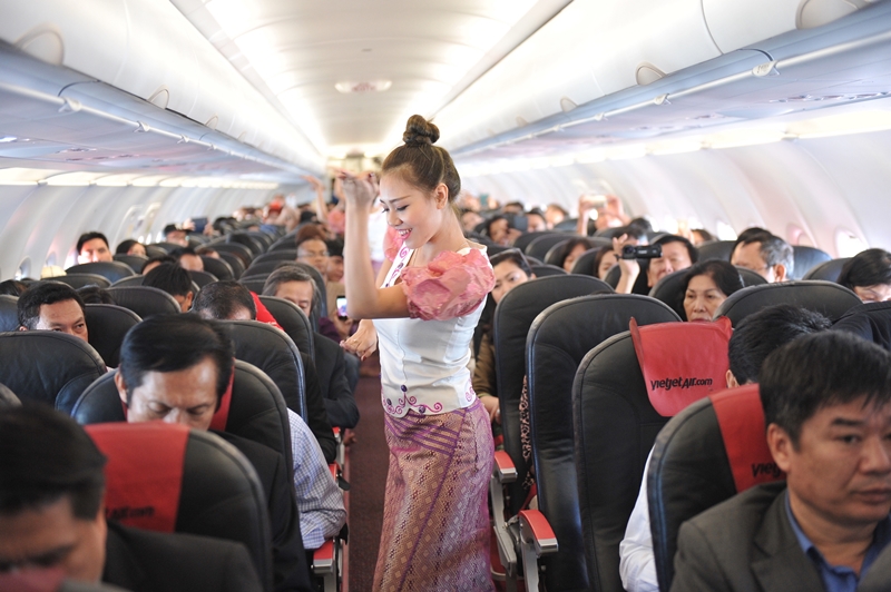 Dancing on board inaugural flight from HCMC to Yangon